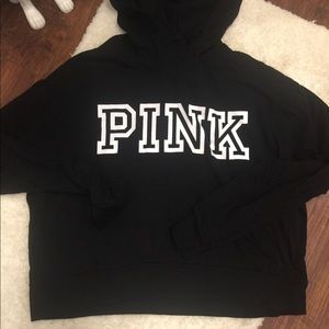 Pink vs black sweat shirt. Cropped